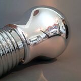 Suspension in the shape of a silver bulb.