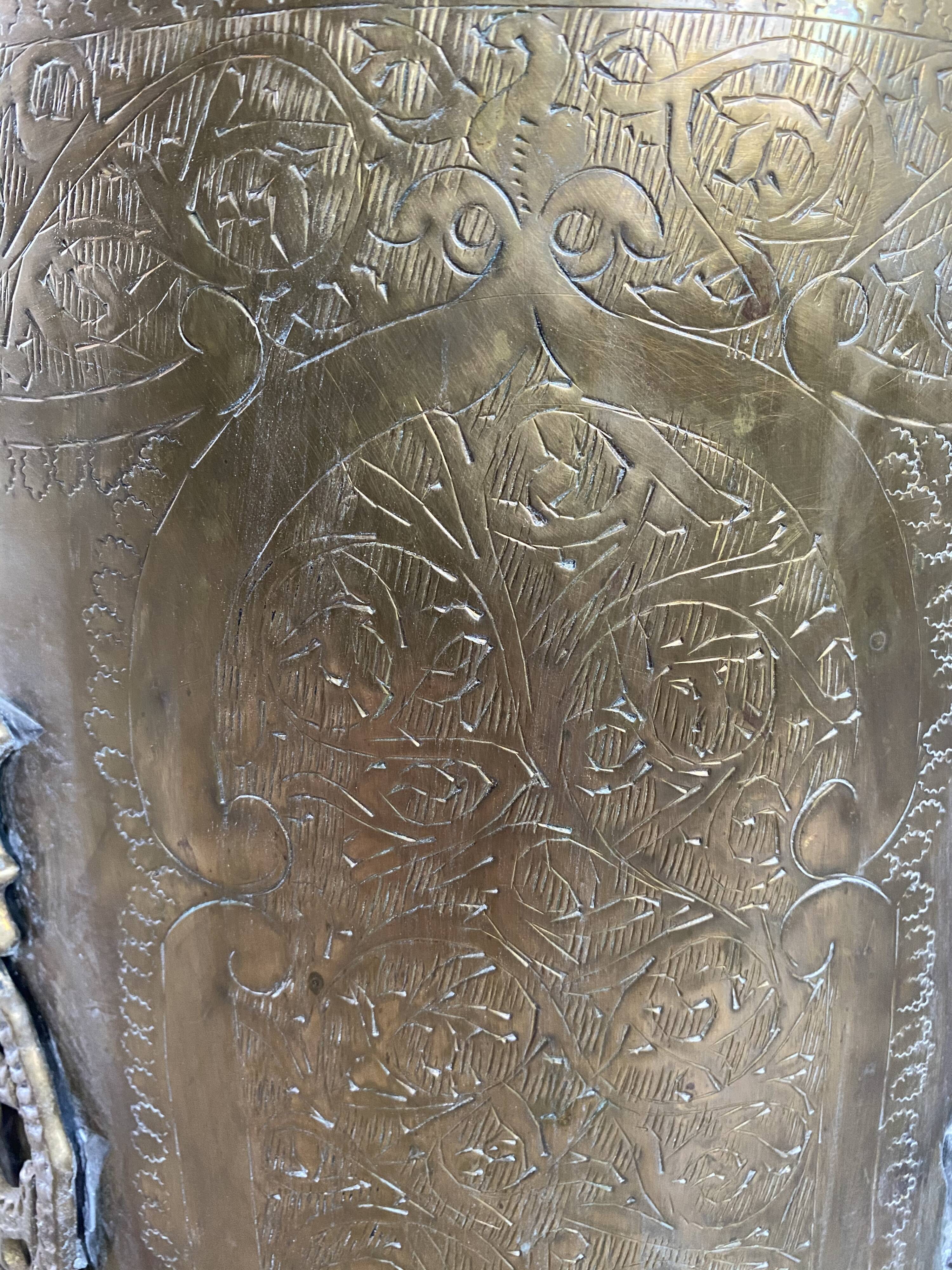 Engraved brass pot cover
