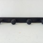 Old wooden wall coat rack