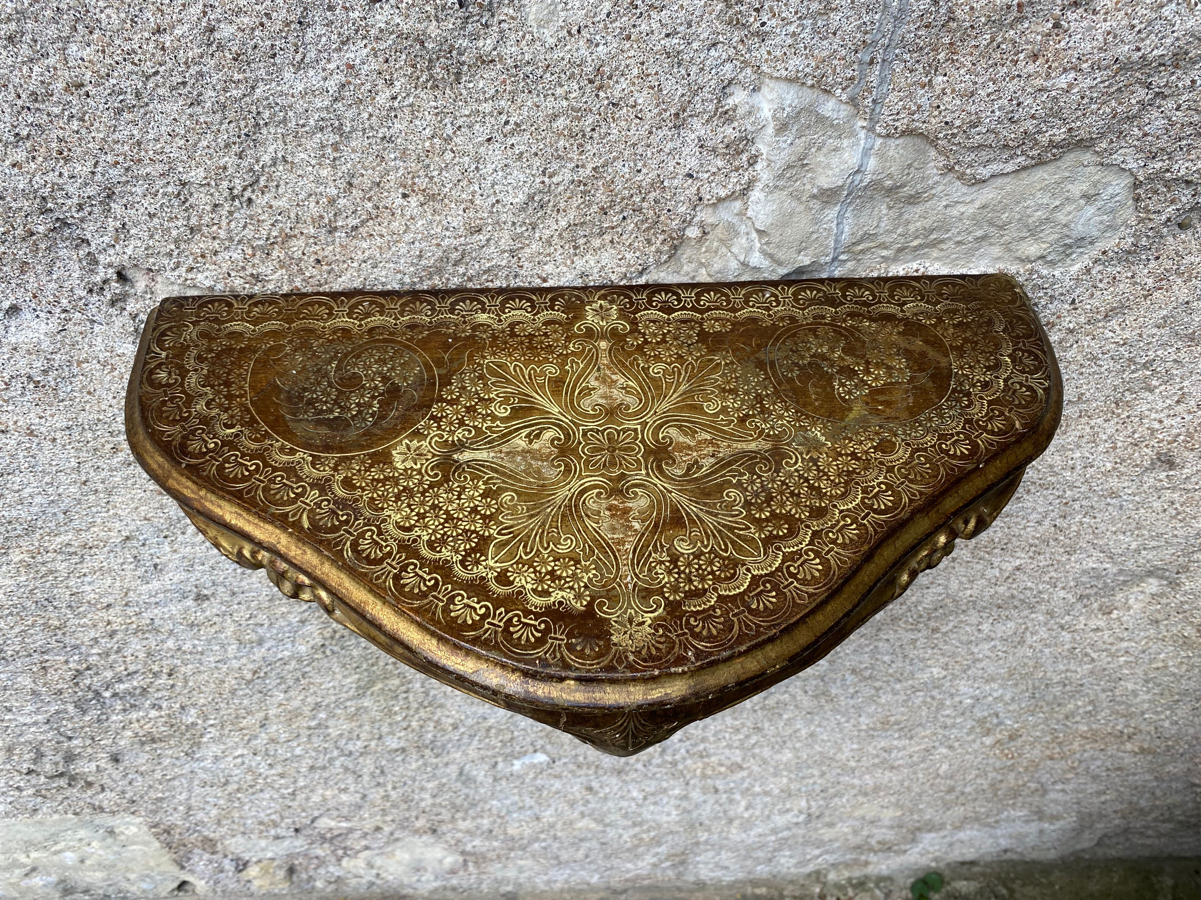 Golden Venetian wall lamp console