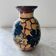 Grand vase décor signé