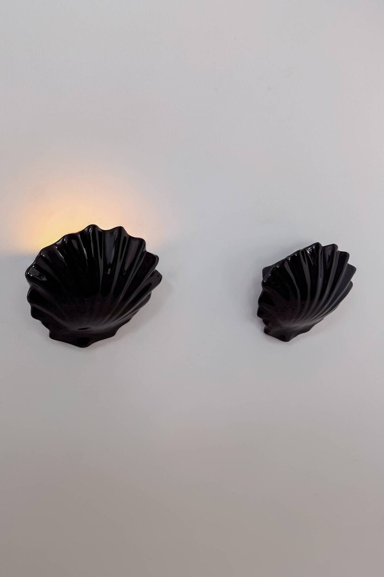 Pair of vintage wall lights in black porcelain, France 1970.