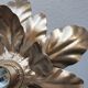 Paire d'appliques : fleurs dorées
