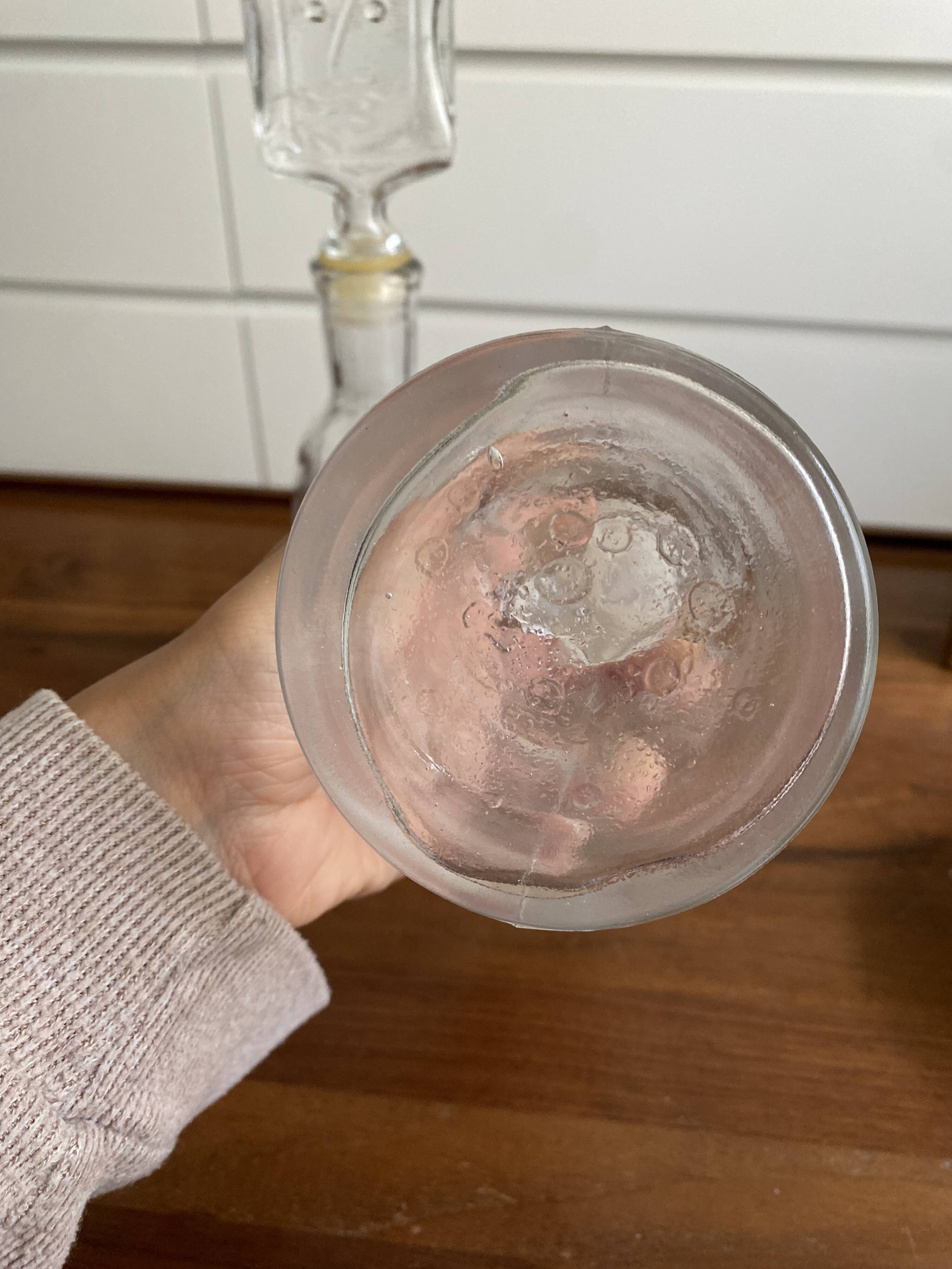 Pair of decanters by Erik Hoglund for Neiman Marcus, "People" series, Kosta Boda