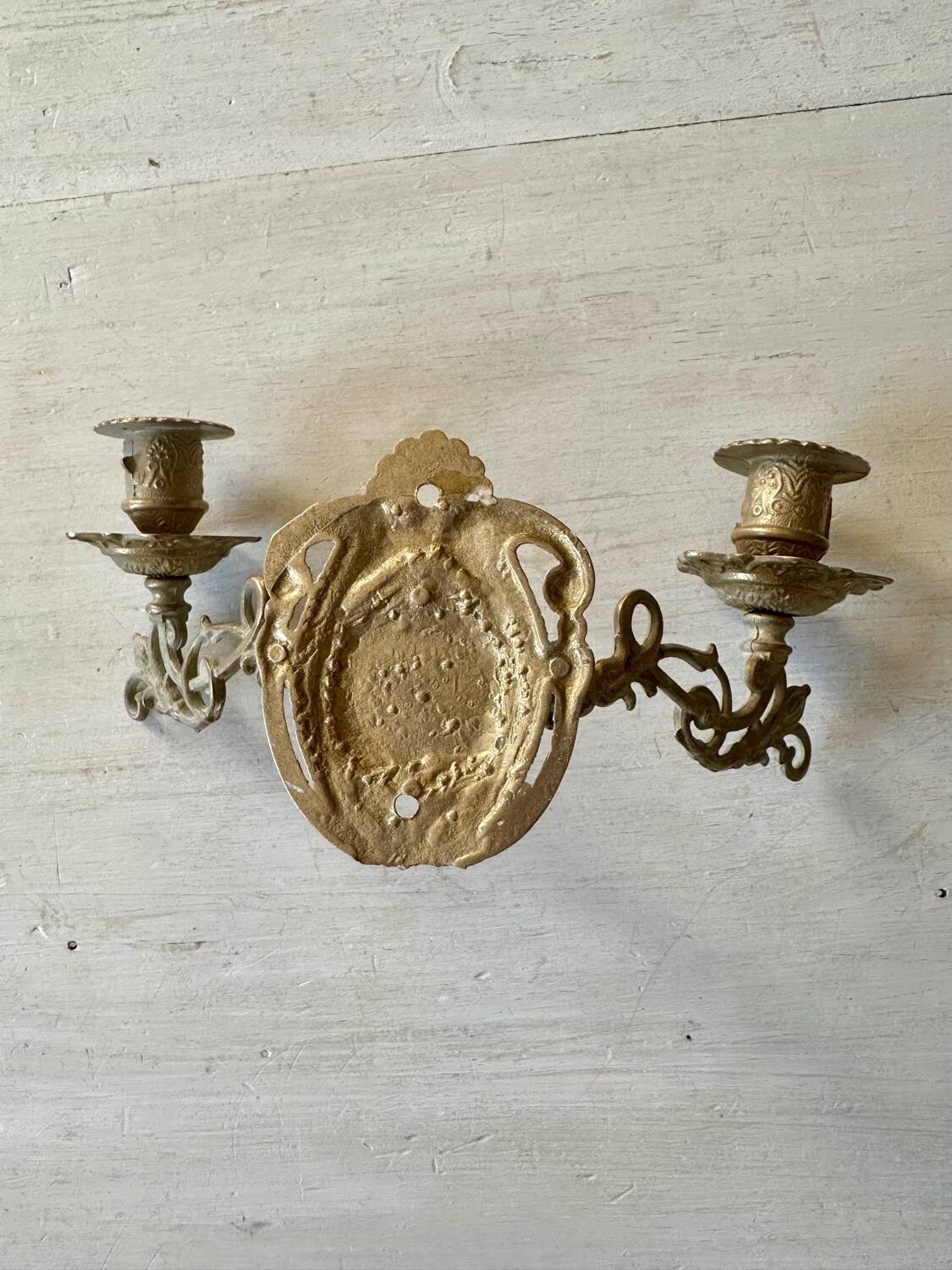 Pair of brass wall candle holders