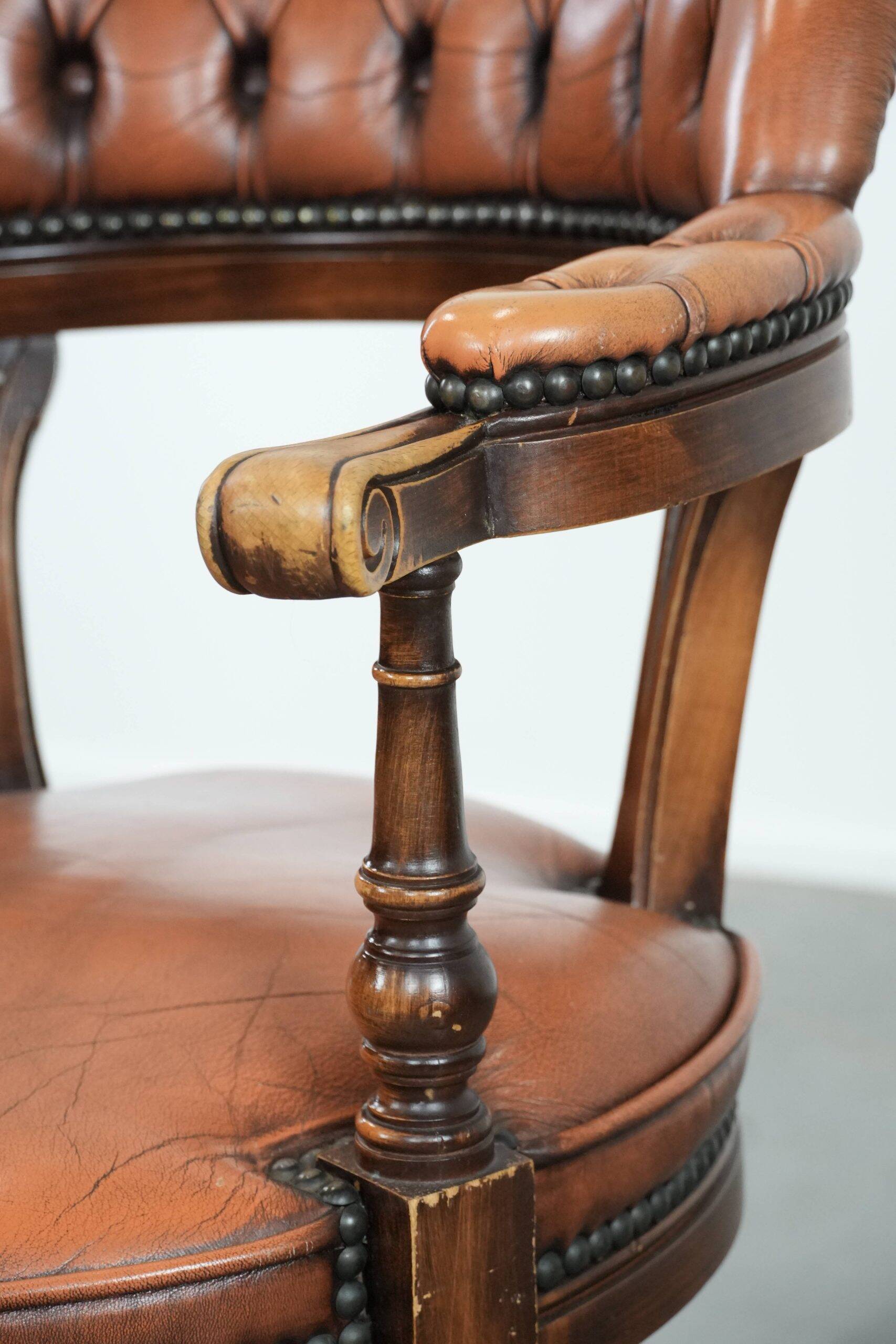 Classic and timeless cow leather and wooden Chesterfield office chair