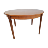 Teak round table with extension cords