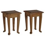 A pair of antique Danish pine stools from the late 19th century.
