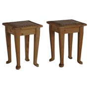 A pair of antique Danish pine stools from the late 19th century.