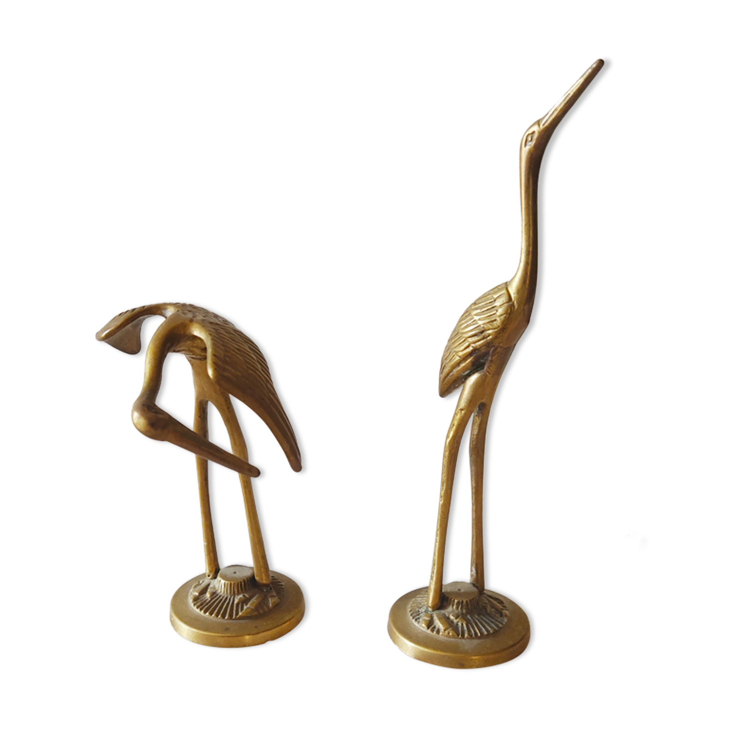 Brass heron duo