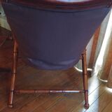 Leather folding armchair and footwork