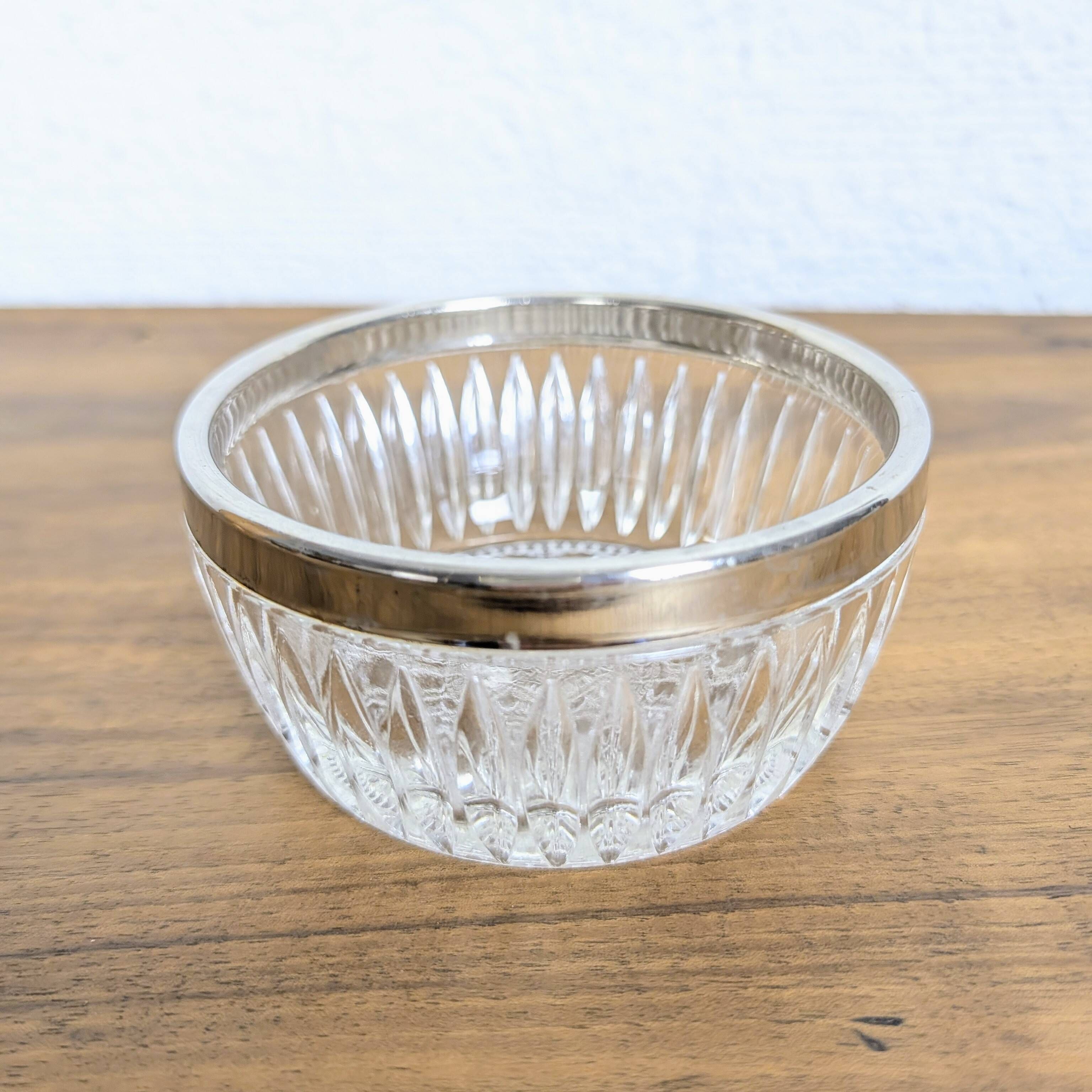 Cut glass bowl with silver-plated edge