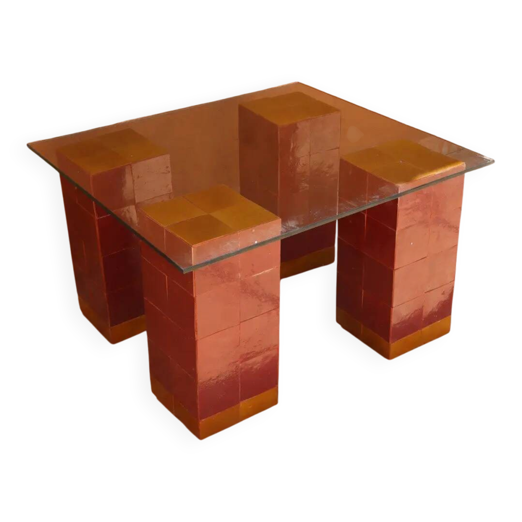 Modern coffee table in burgundy zellige with a tempered glass top.