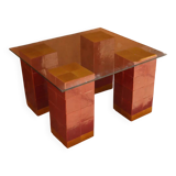 Modern coffee table in burgundy zellige with a tempered glass top.