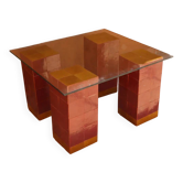 Modern coffee table in burgundy zellige with a tempered glass top.