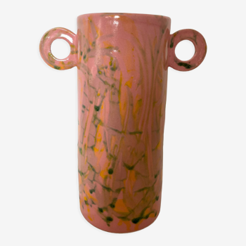 Pink ceramic vase with abstract circular handles