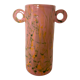 Pink ceramic vase with abstract circular handles