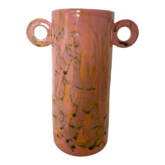 Pink ceramic vase with abstract circular handles