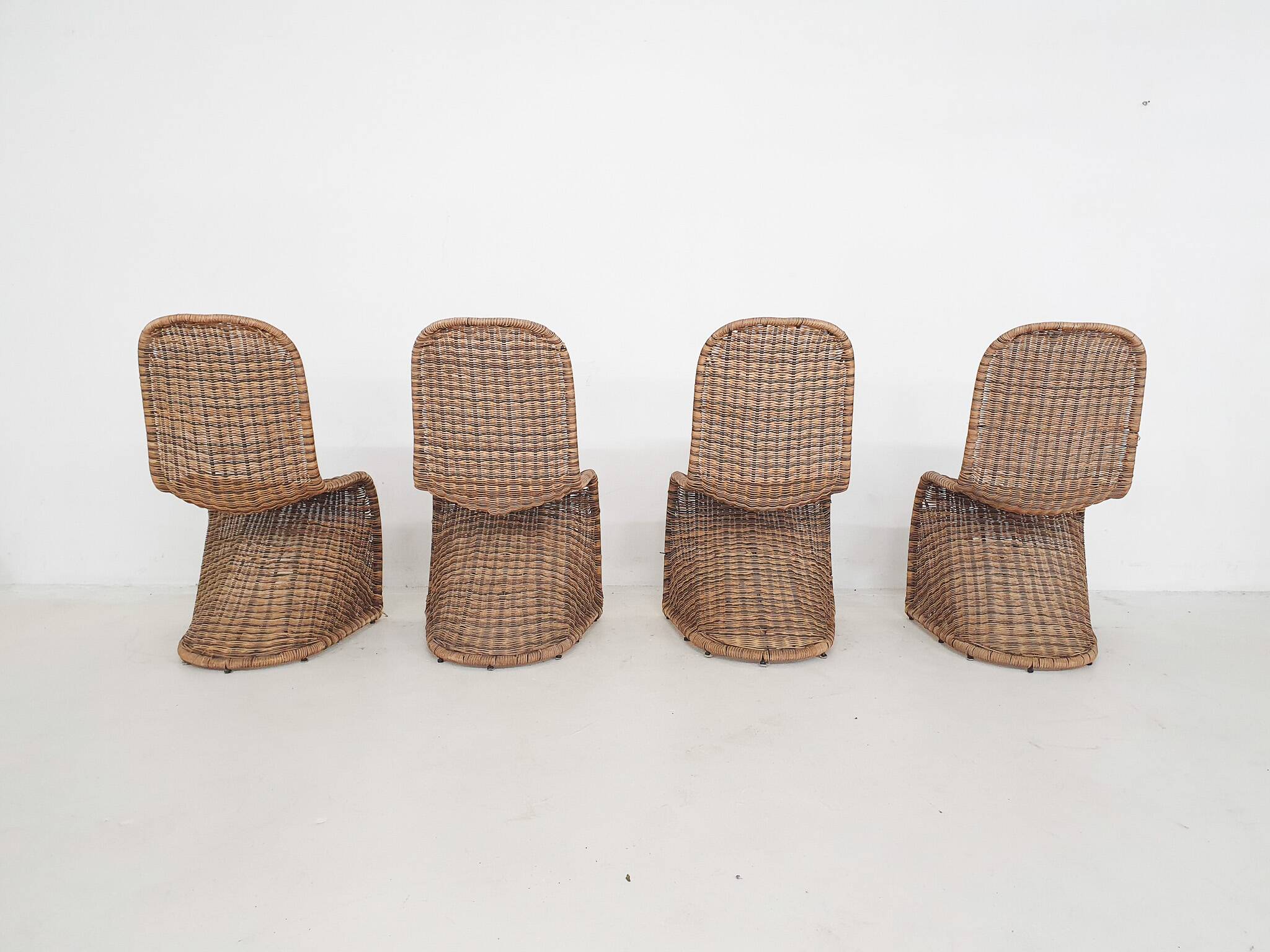 Set of four rattan S-chairs