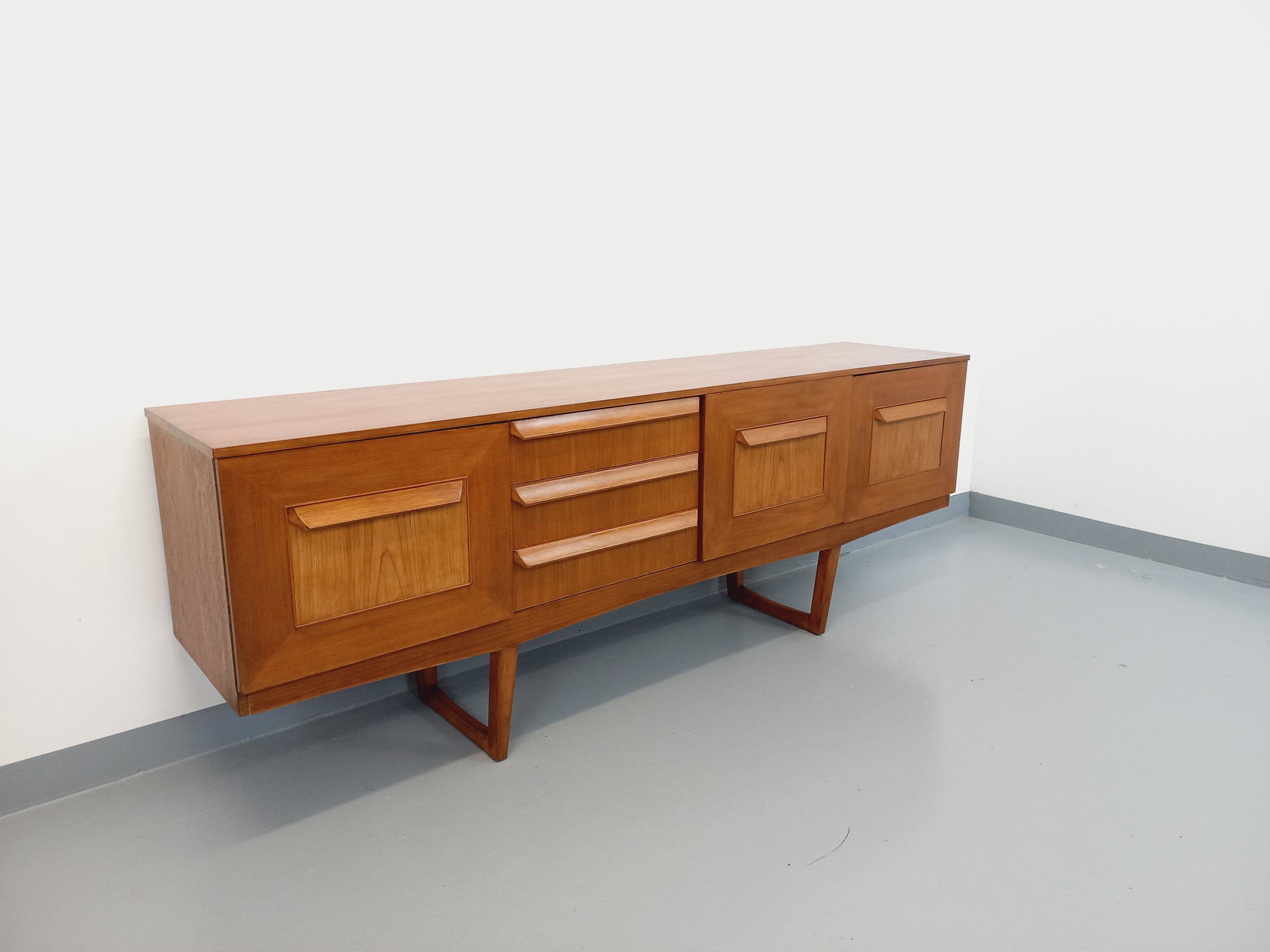 Vintage Scandinavian style sled foot sideboard in teak from the 60s