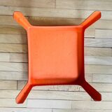 Small orange fiberglass side table from the 70s