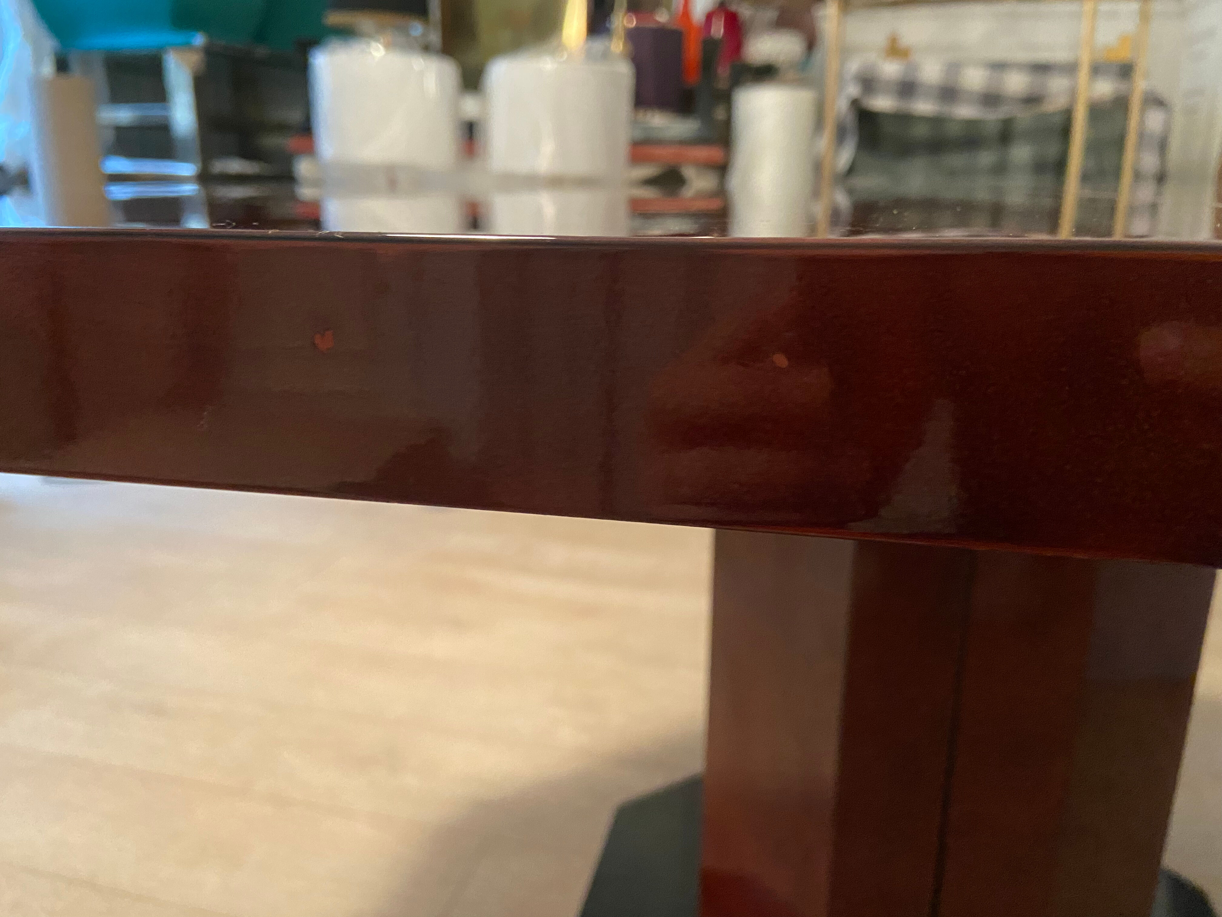 Red lacquered dining table and gold dust, 1970s