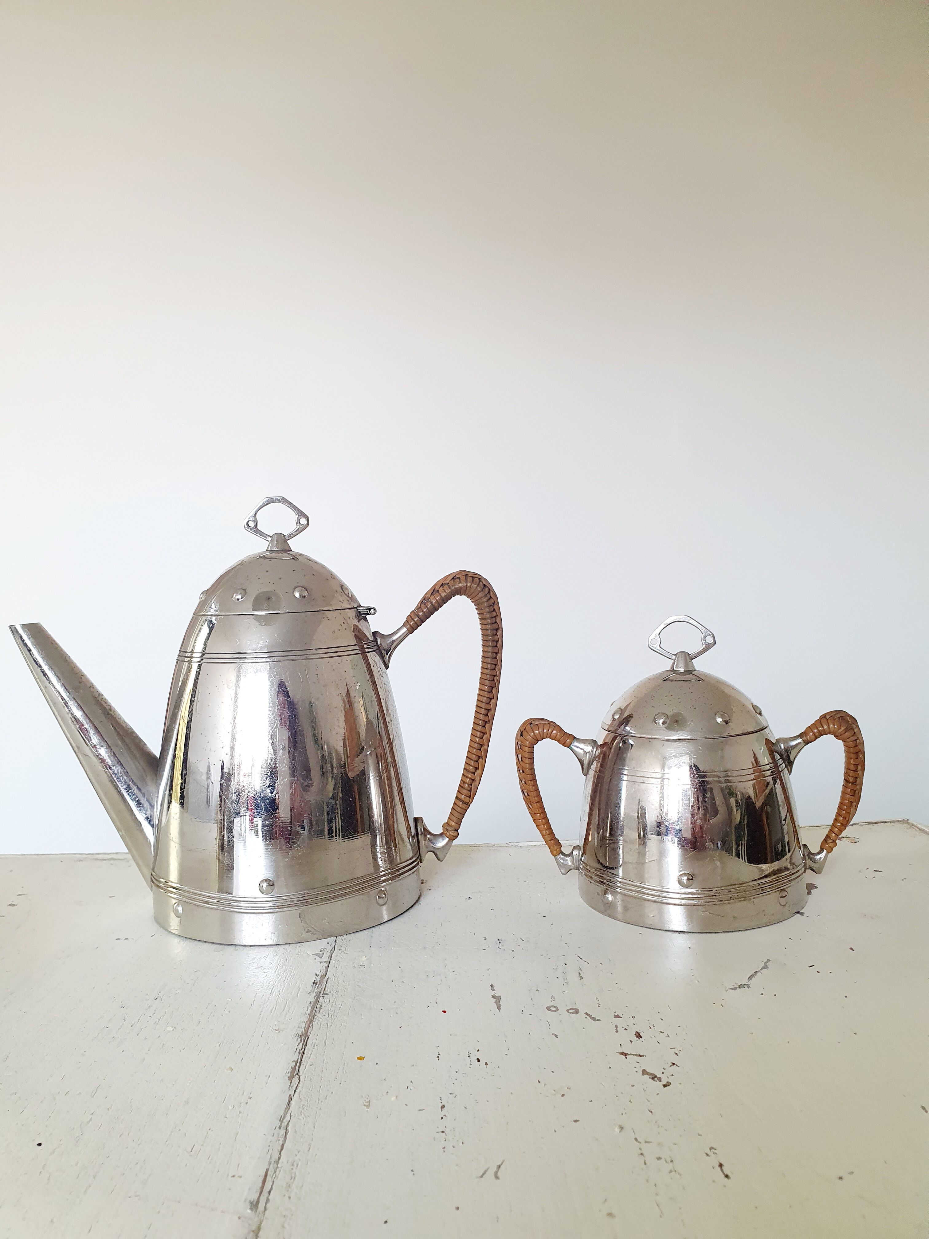 Coffee maker, milk pot and sugar bowl set