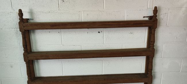 Old oak shelf back of glass counter wall