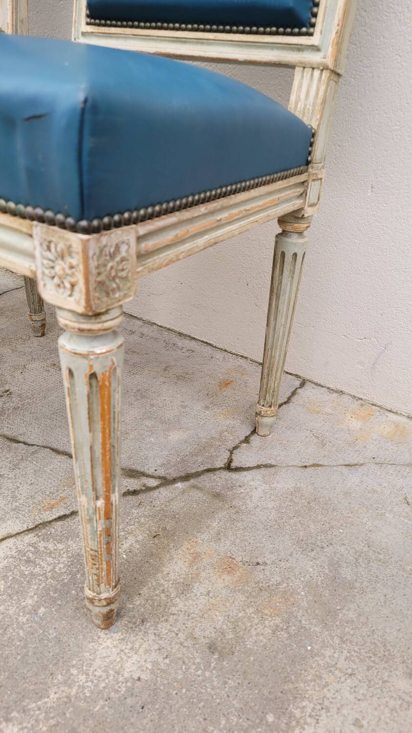 Pair of antique Louis XVI style chairs with patina