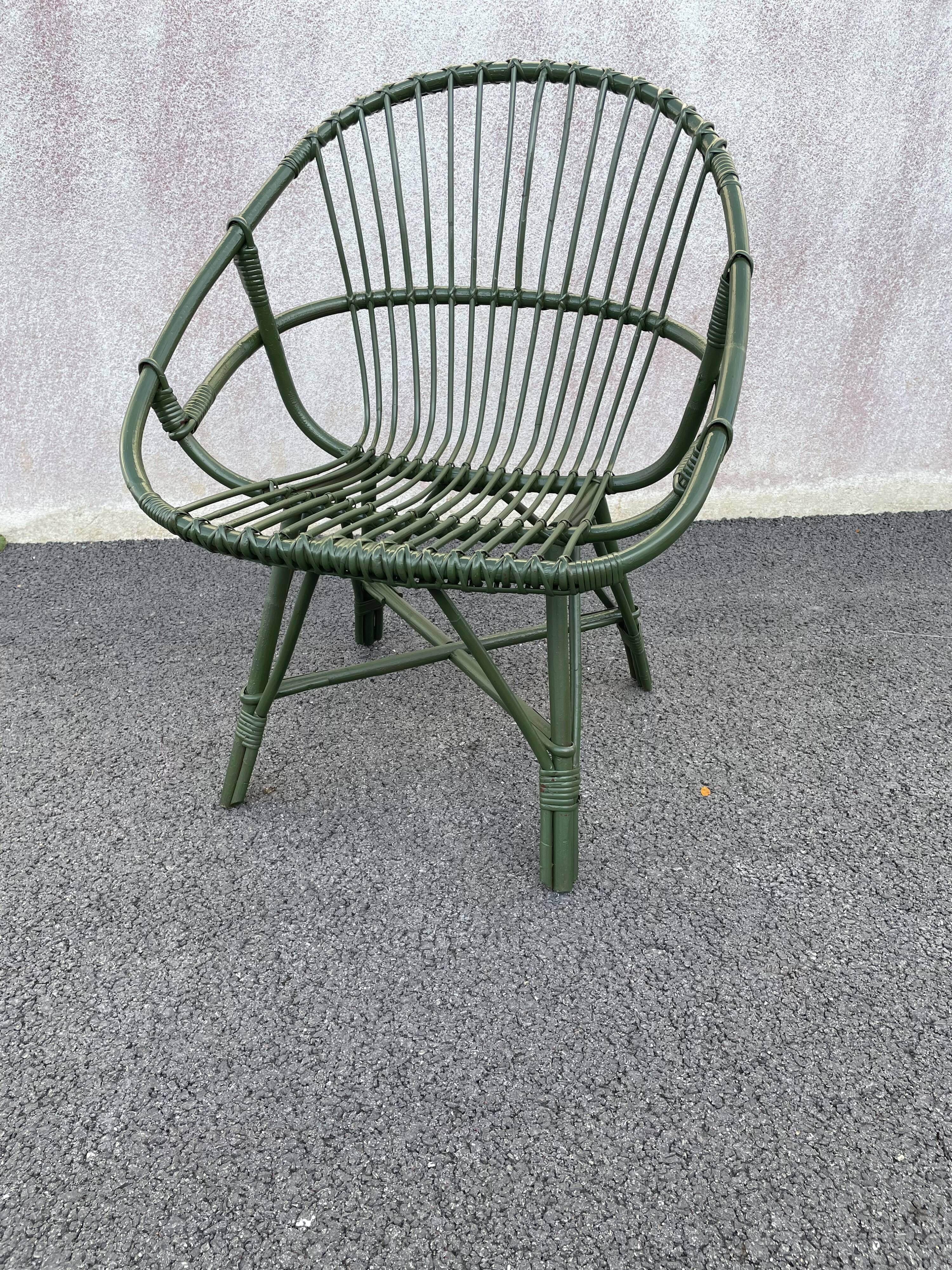 Green rattan armchair