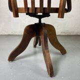 Baumann rotating wooden armchair