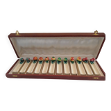Set of 12 slip knife holders in their case