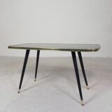 Vintage coffee table with glass top and angled legs, 1950s