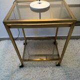 Brass rolling trolley with smoked glass from the 70s