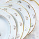 4 assiettes creuses l’amandinoise en porcelaine blanche dorées motif fleuris