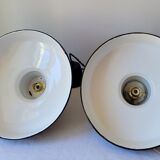 Duo of suspensions in enamelled sheet metal