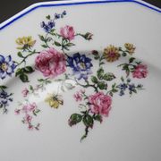 4 flat plates by Bernardaud, Limoges porcelain, floral decoration from the 1920s to 1950s.