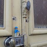 Porte d'entrée cintrée double en chêne, grilles et verre, XIXème