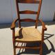 Ancien fauteuil à l'assise paillée
