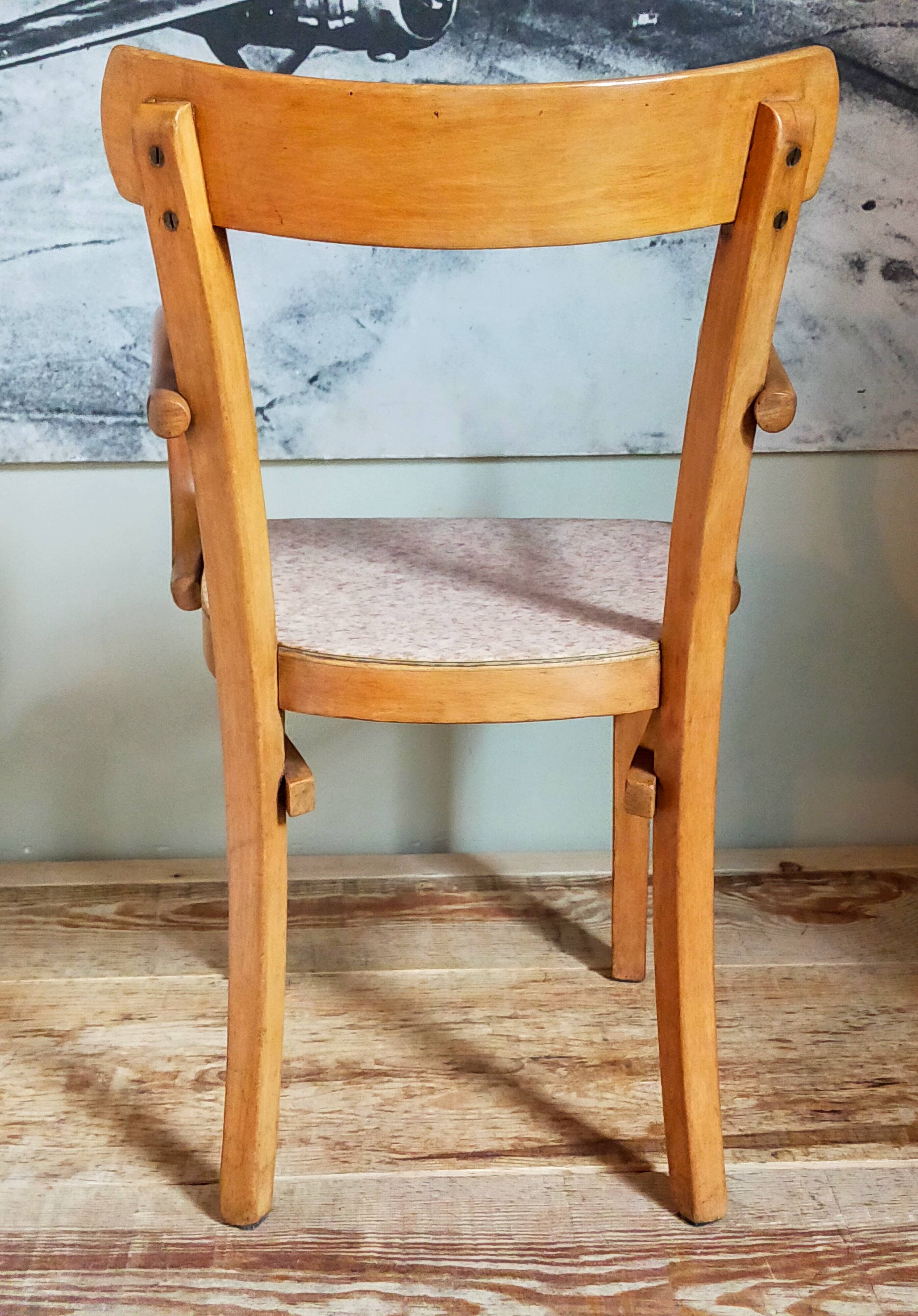 Children's armchair in old bent wood