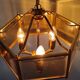 Brass pendant lamp and five-faceted vintage smoked glasses