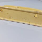 Pale yellow ceramic soap dish