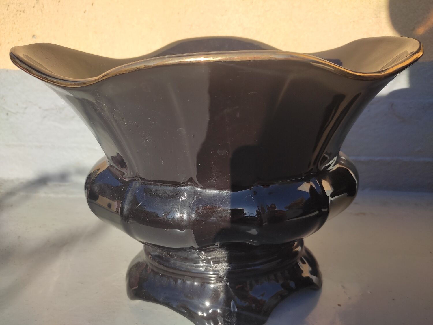 Pair of black earthenware planters