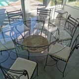 Lot table en verre et 10 chaises en fer forgé