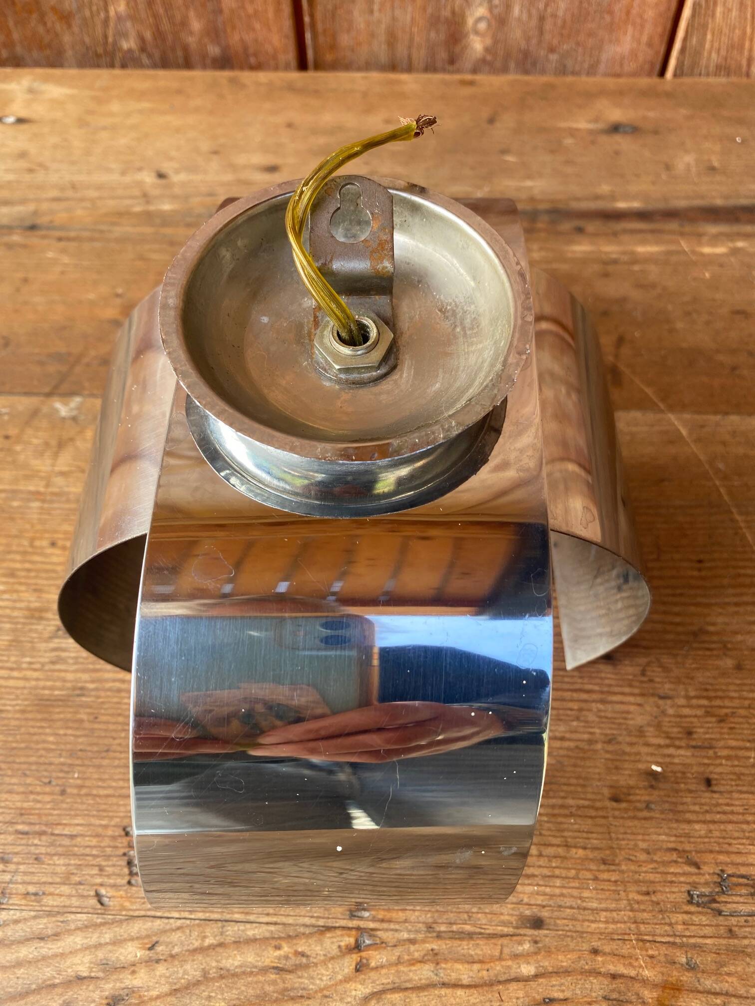 Applique space age chromé