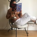 Vintage hairdresser's armchair with helmet transformed into a lamp