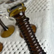 Footed glasses of the Roemer type, amber colour