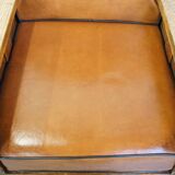 Fauteuil ancien en peau de mouton retapissée