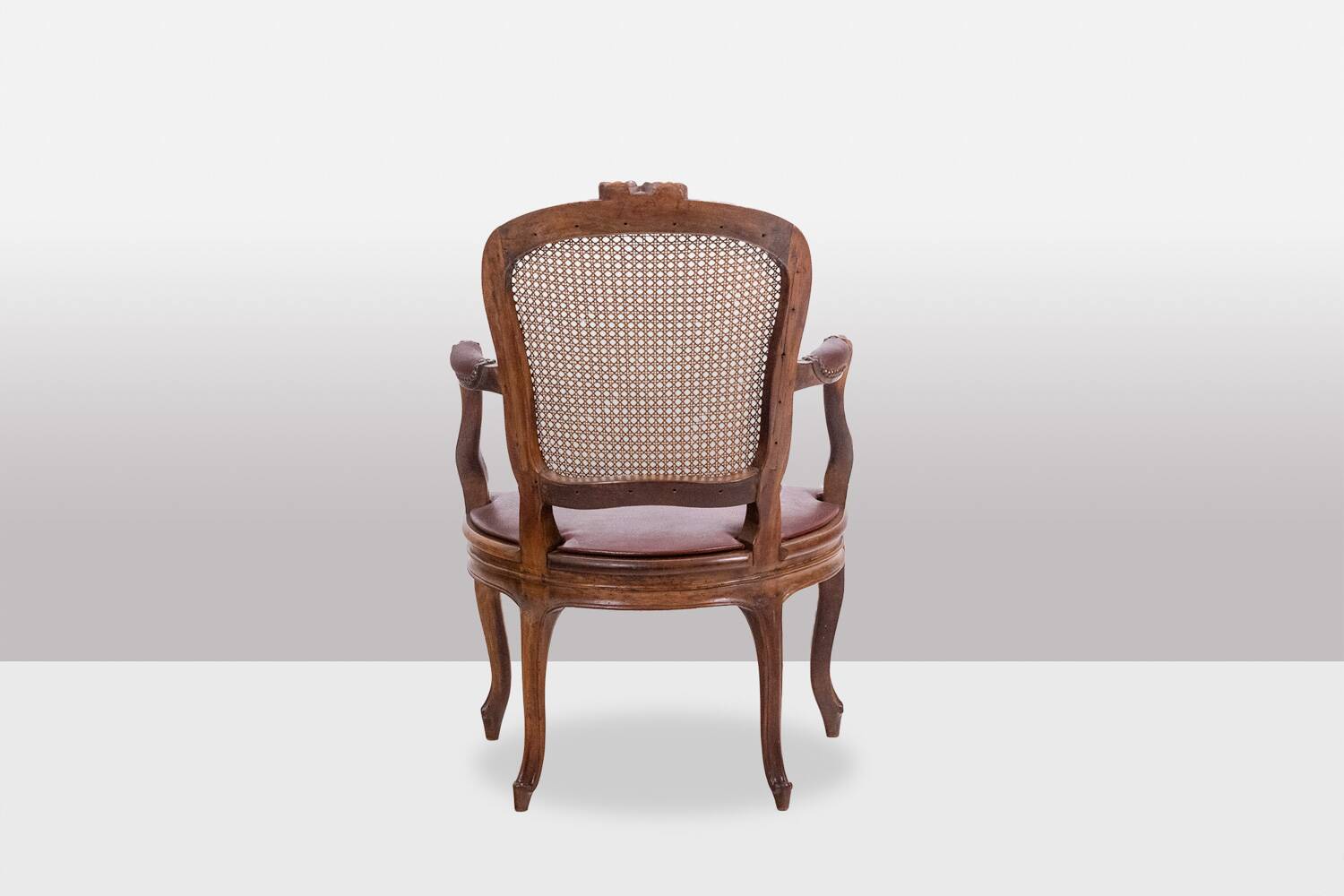 Pair of “cabriolet” armchairs in walnut and canework. Louis XV period. LS5209325