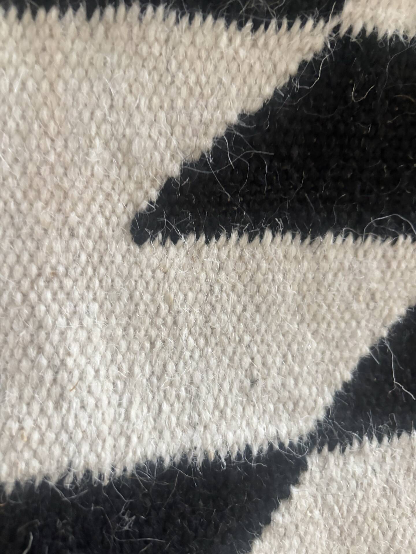 Wool kilim rug with geometric patterns – black & ecru